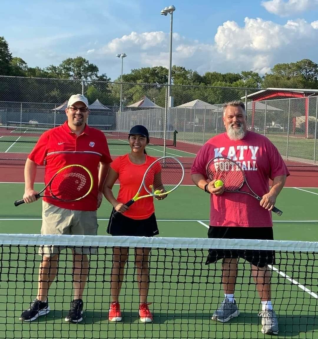 Council Member-at-Large and Mayor Pro Tem Chris Harris, Aileen Rios of Harvest Midstream, and Ward B Council Member Rory Robertson take the court for a friendly game of tennis.